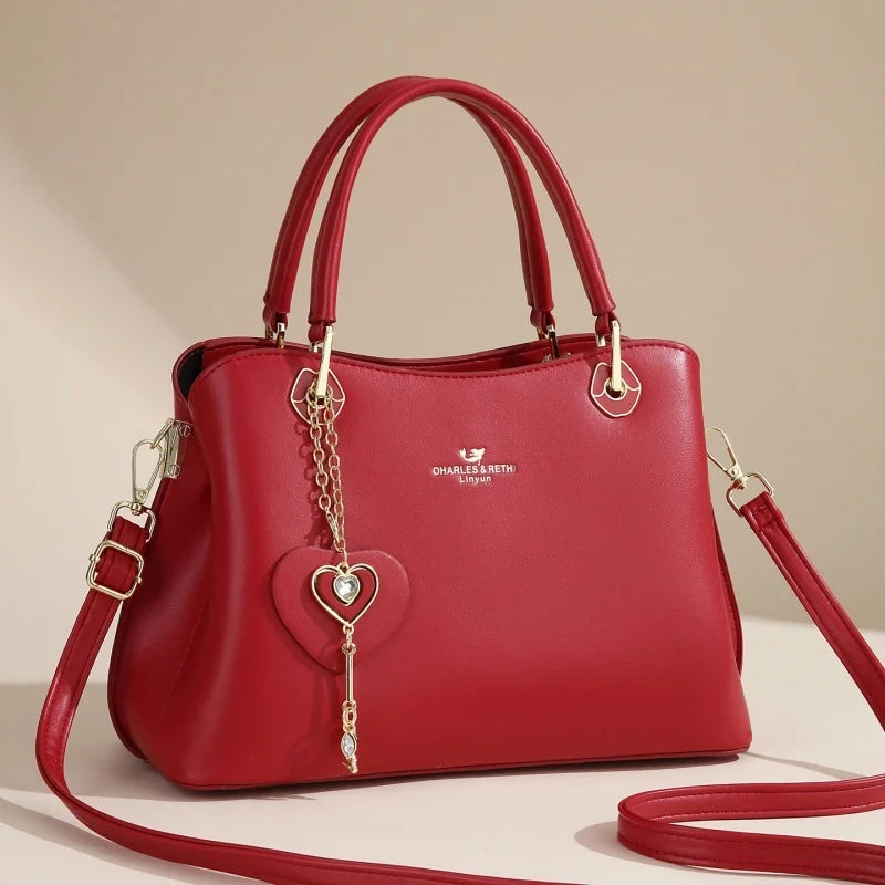 2025 New Original Design with Heart Pendant Large Capacity Work Travel Shopping Tote High Quality Elegant Women's Handbag
